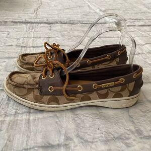Coach women 8.5 canvas and leather slip on boat shoes w/leather ties